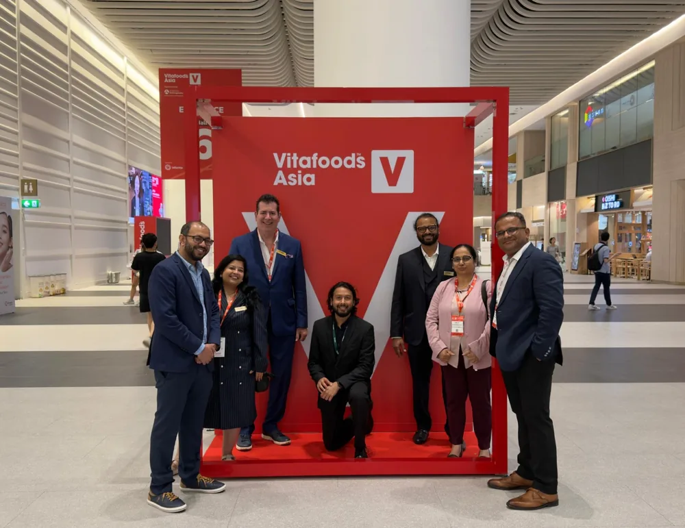 The Greenspace Herbs team at the Vitafoods Asia 2026 entrance frame