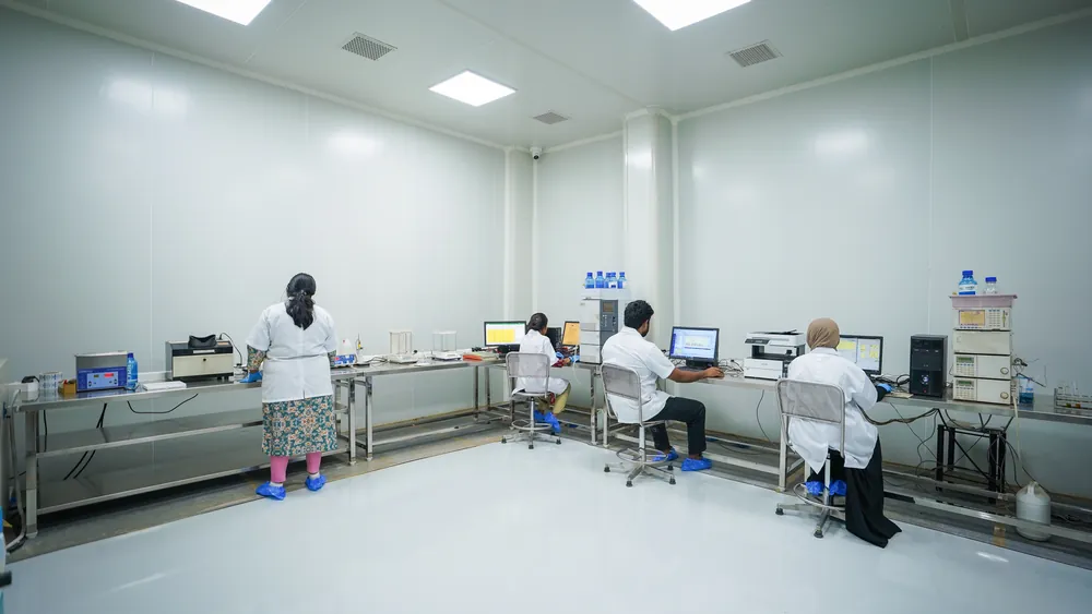 The quality-control laboratory with analysts at their workstations