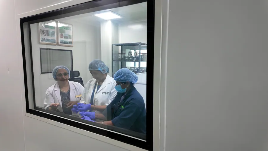 Scientists at work, seen through the lab window